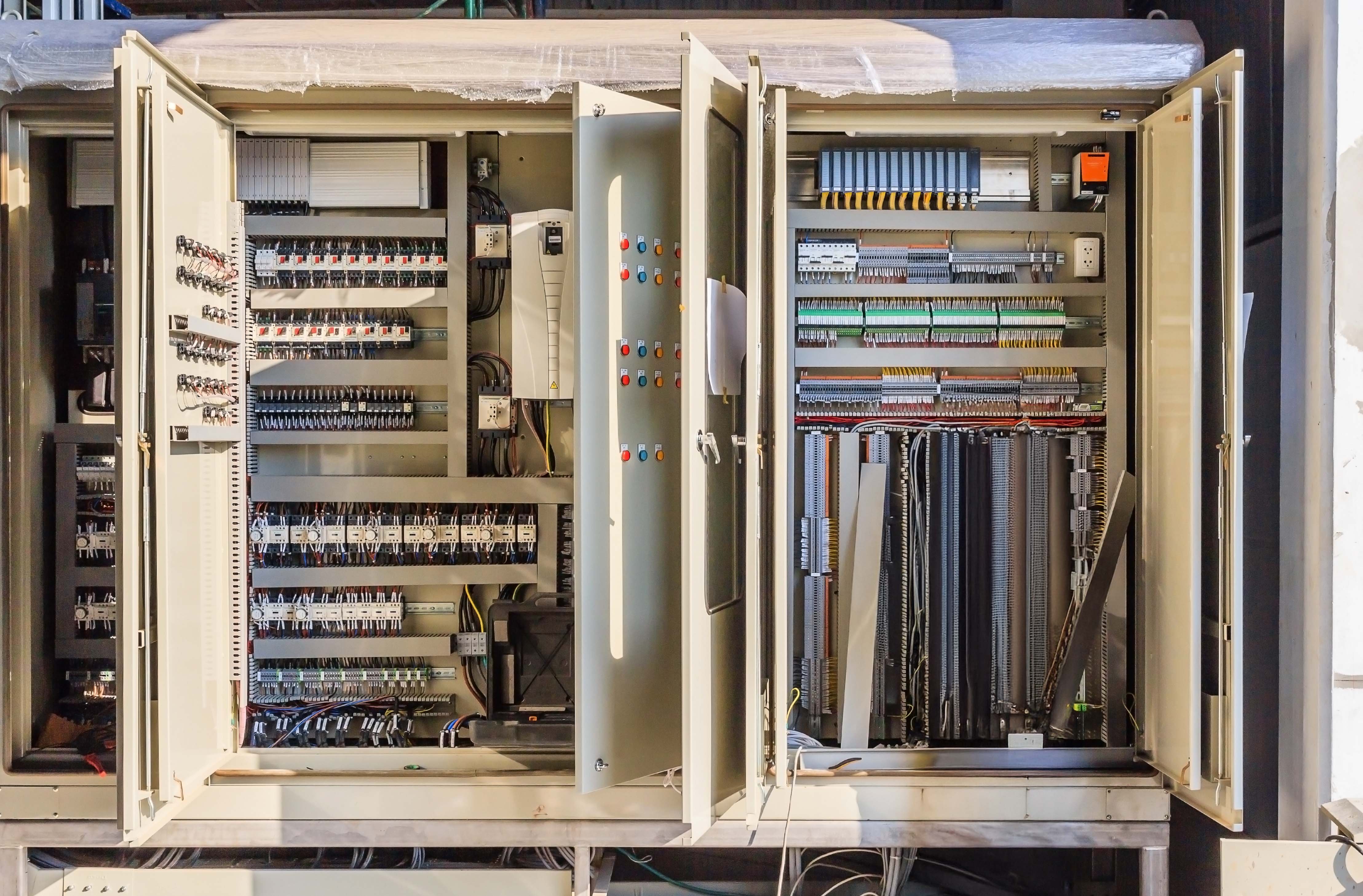 Close up of an open PLC Cabinet, showing the many components.